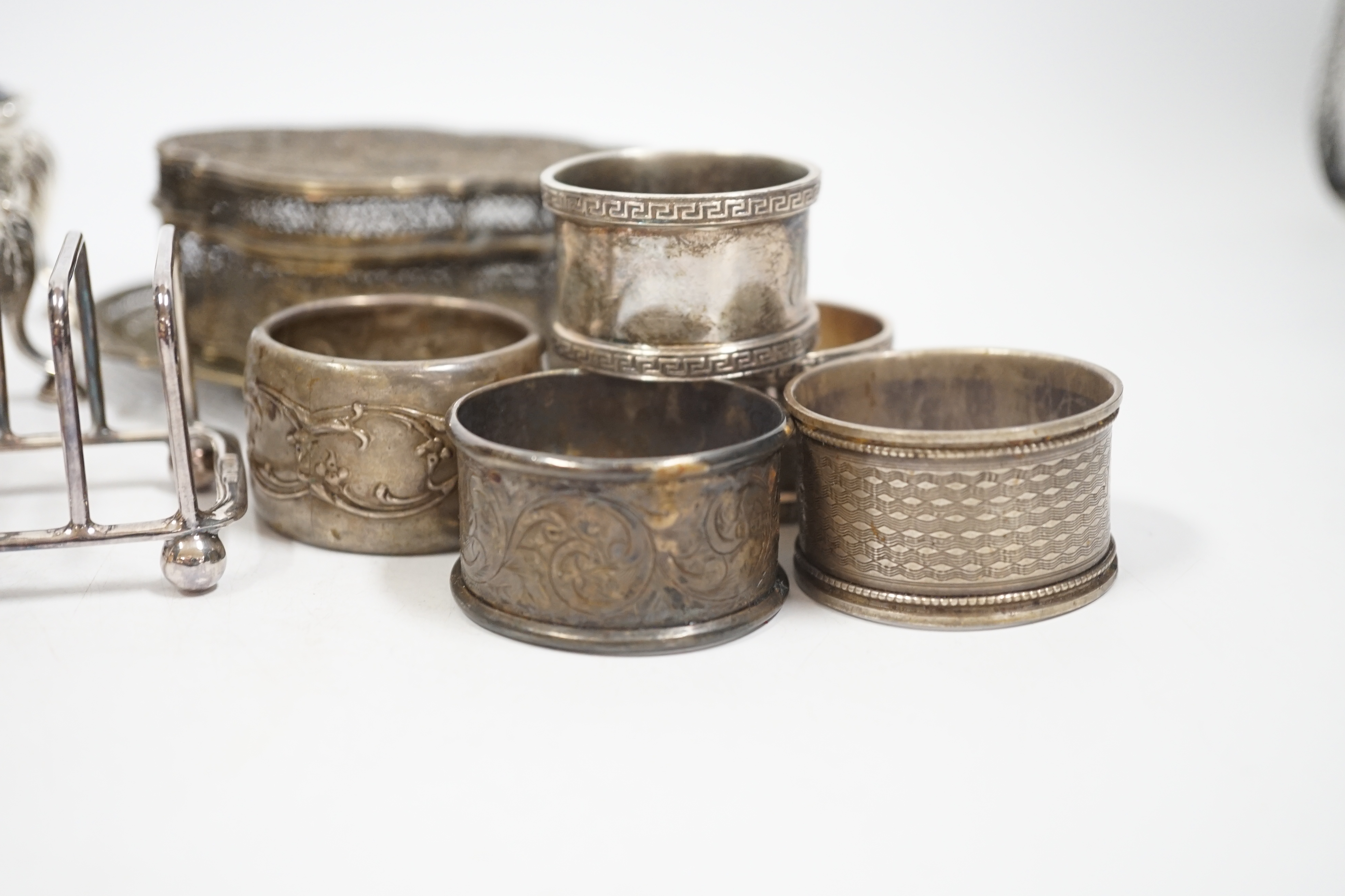 Five assorted Georgian silver bun salts and sundry small silver wares including napkin rings, flatware and white metal items.